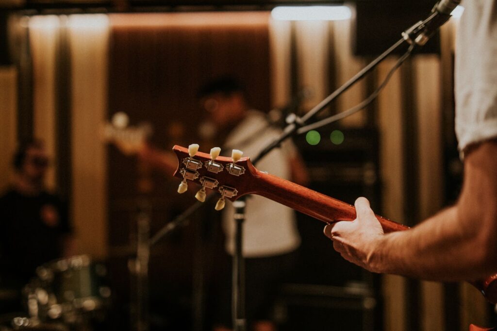 Close up of musician playing guitar