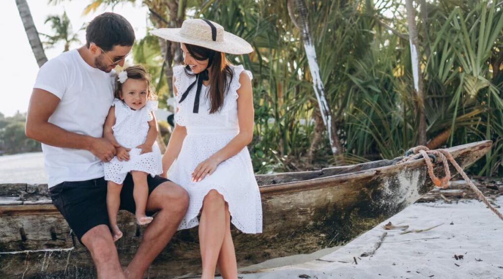 A family enjoying time together seated on a rustic boat